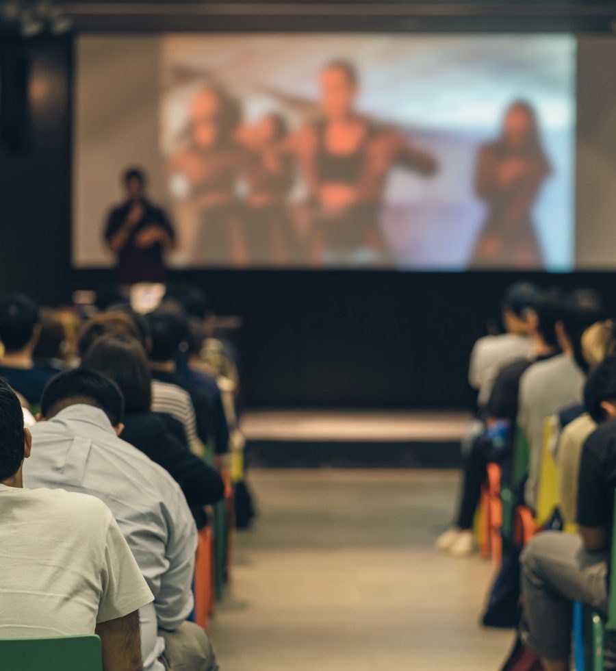 rear-view-of-asian-audience-joining-and-listening-speaker-talking-on-the-stage-in-the-seminar.jpg